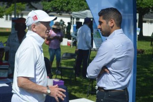 Globe and Mail CEO Phillip Crawley seen talking with Cricket Canada's Zubin Surkari (High Performance Program).