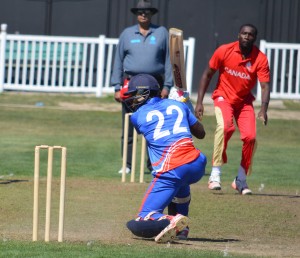 Mark Montford bowls to Dion Stovell